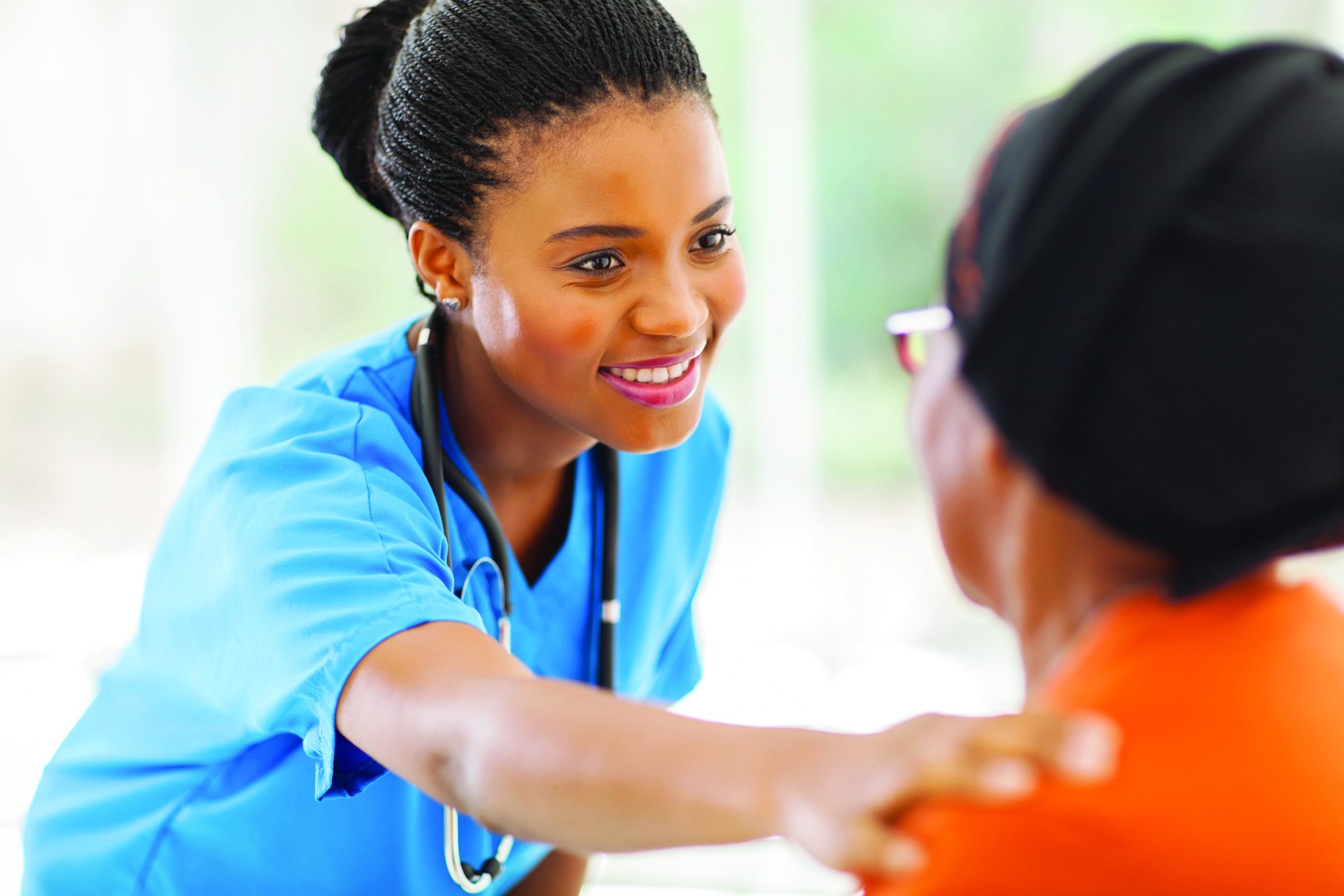 a nursing student caring for a patient