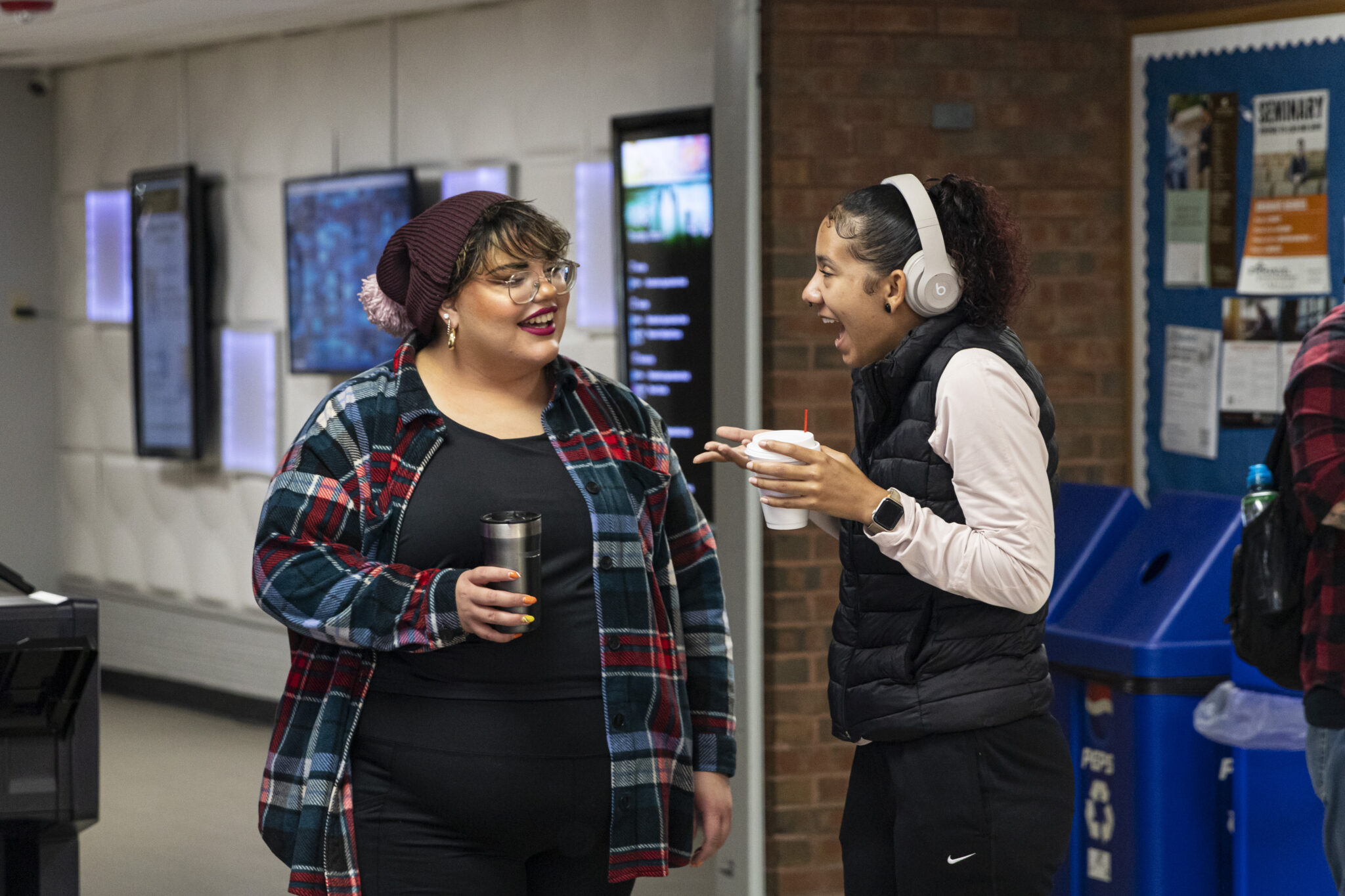 Happy college students attending one of the best Christian colleges in Michigan