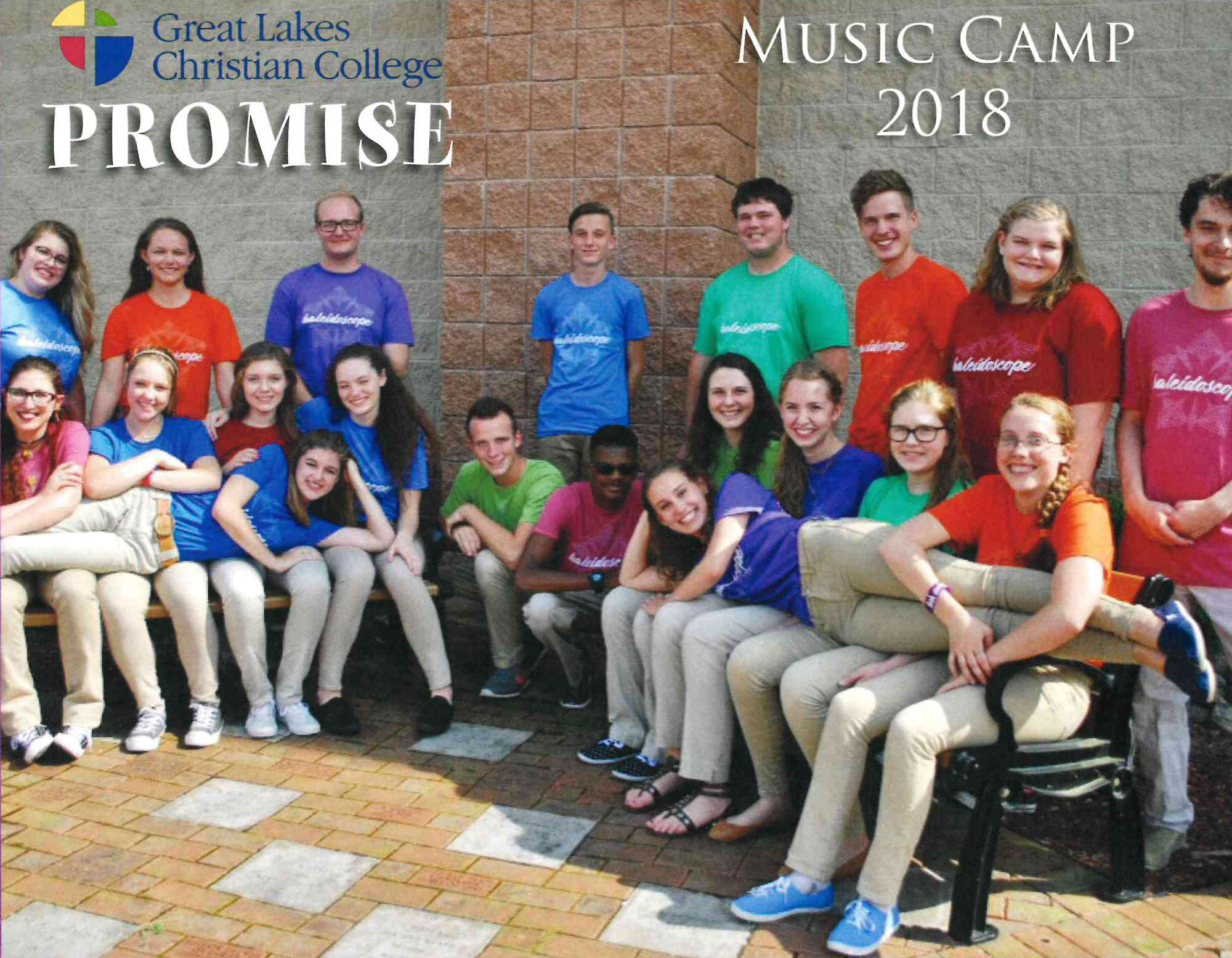 outdoor group photo of high school students near a building wall on GLCC campus for Promise Performing Arts Camp