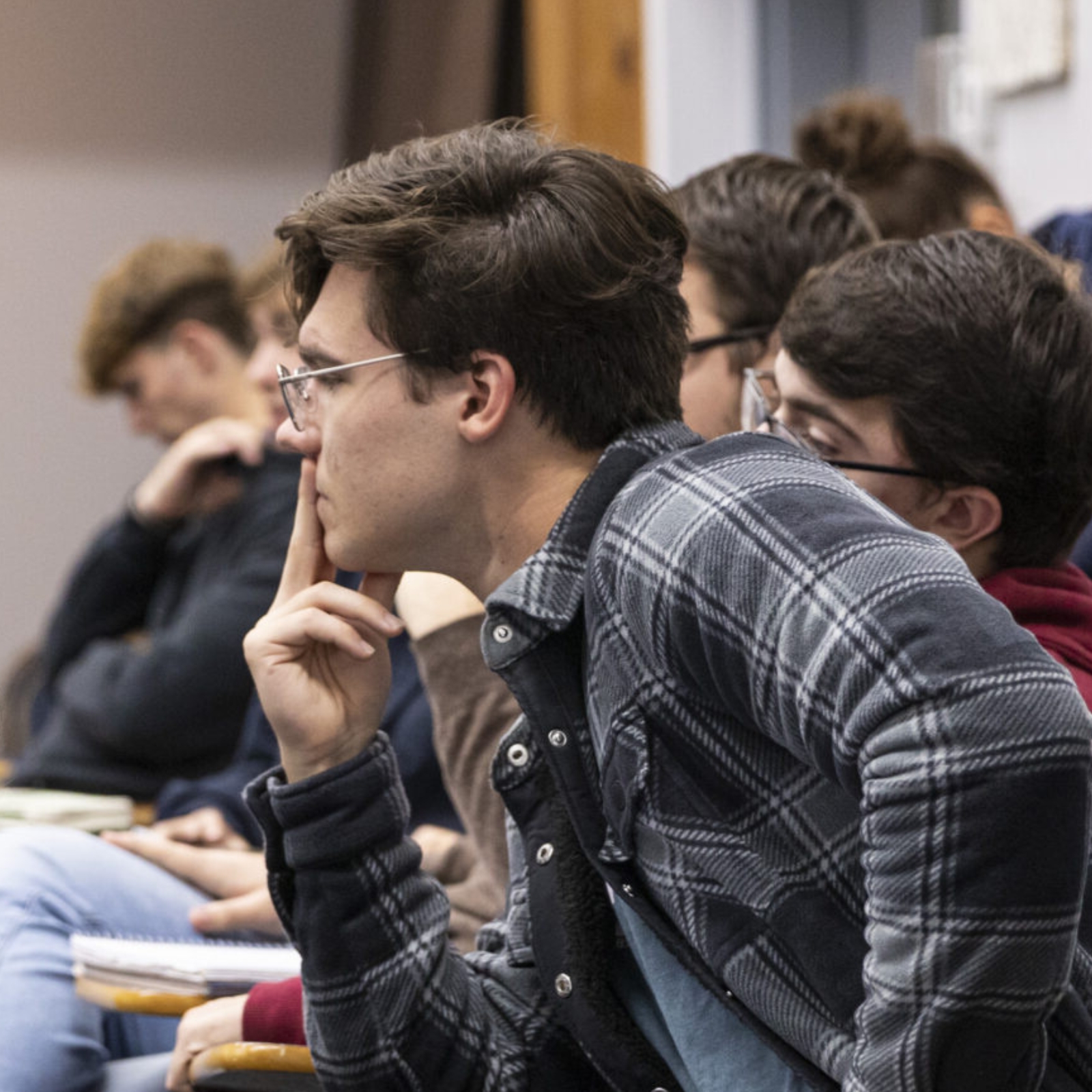 boy looking left concentrating